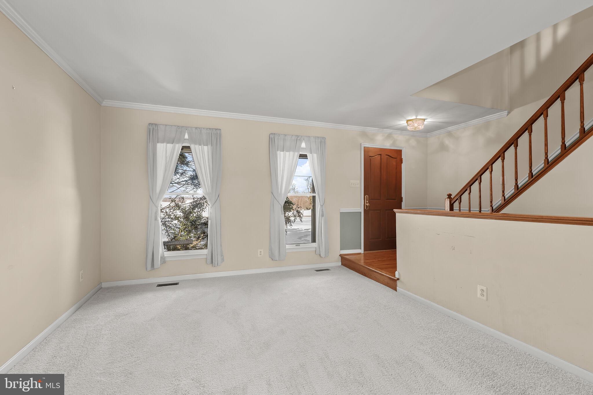 16445 Old Frederick Road Mount Airy, MD 21771 - Photo 7 of 62 Living Room | Crown Moldings | New Carpet