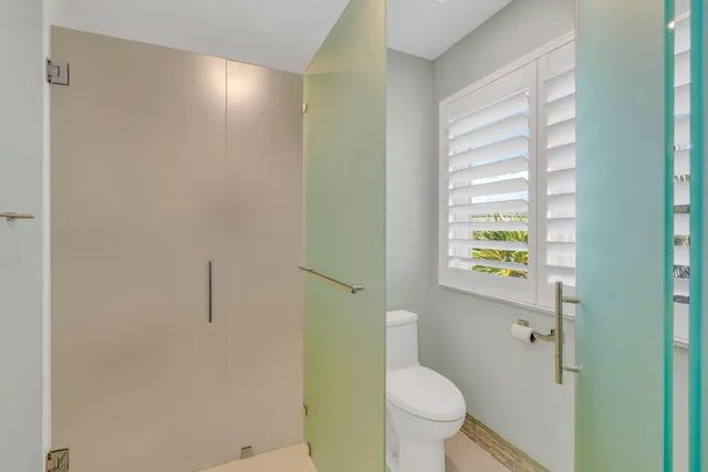 a bathroom with a sink double vanity and a mirror