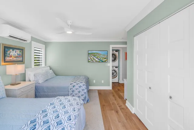 a bedroom with a large bed and a couch