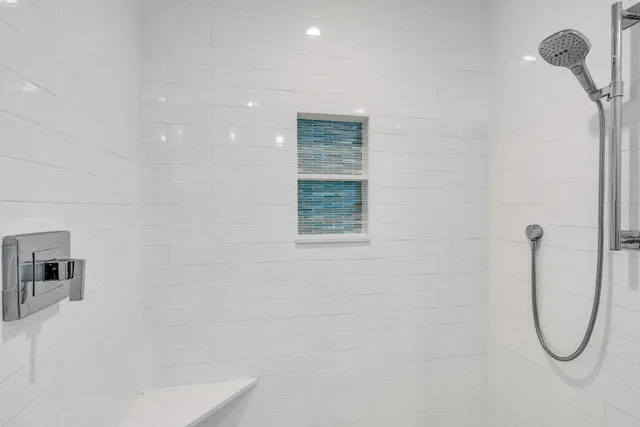 a view of a hallway with washer and dryer