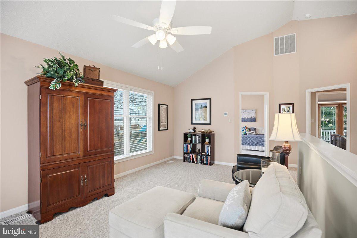 14382 Sedwick Avenue Solomons, MD 20688 - Photo 73 of 90 Large living room through to bedroom 2
