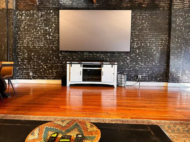 a view of a living room with a swimming pool
