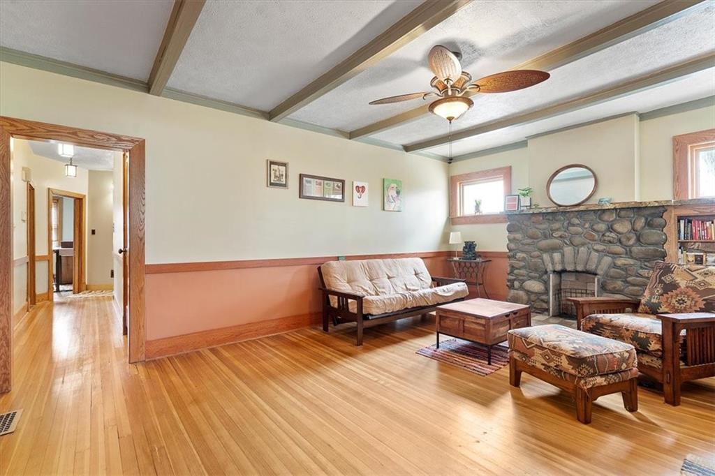 276 Forest Grove Road Coraopolis, PA 15108 - Photo 3 of 25 a living room with furniture and a fireplace