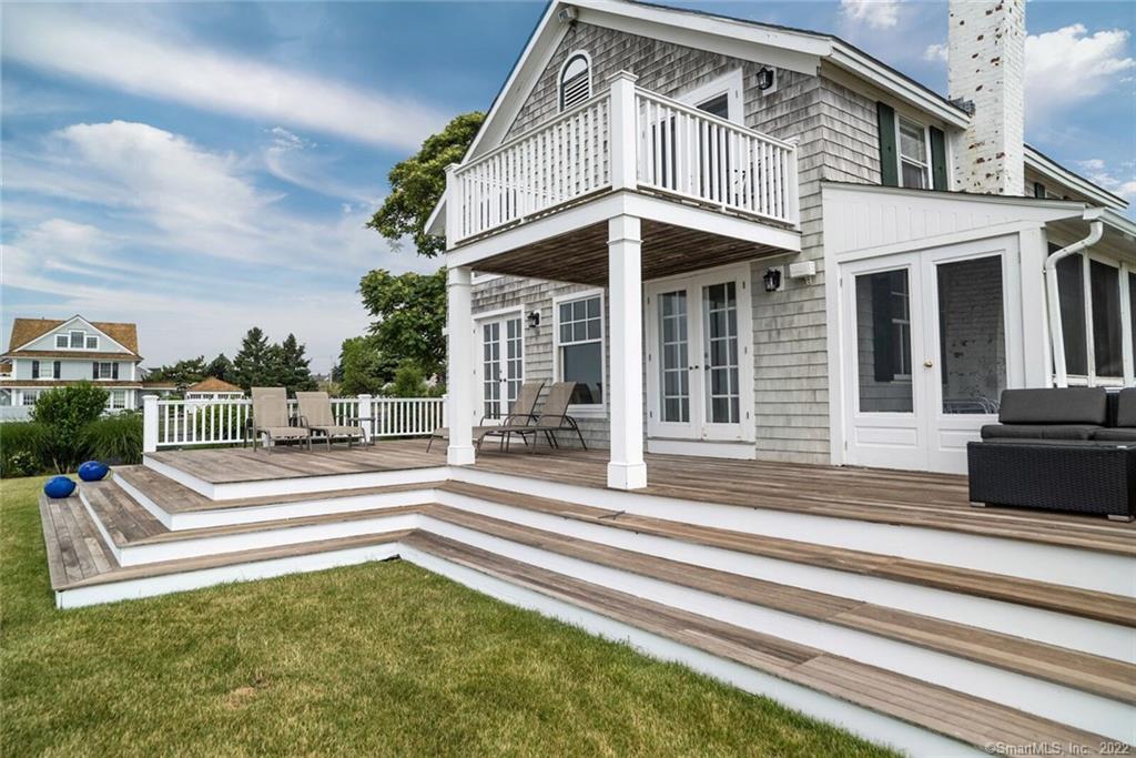 43 Soundview Avenue Madison, CT 06443 - Photo 23 of 31 a front view of a house with a swimming pool