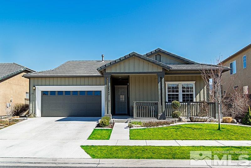 10522 Eagle Falls Way Reno, NV 89521 - Photo 1 of 1 a front view of a house with a garden and yard