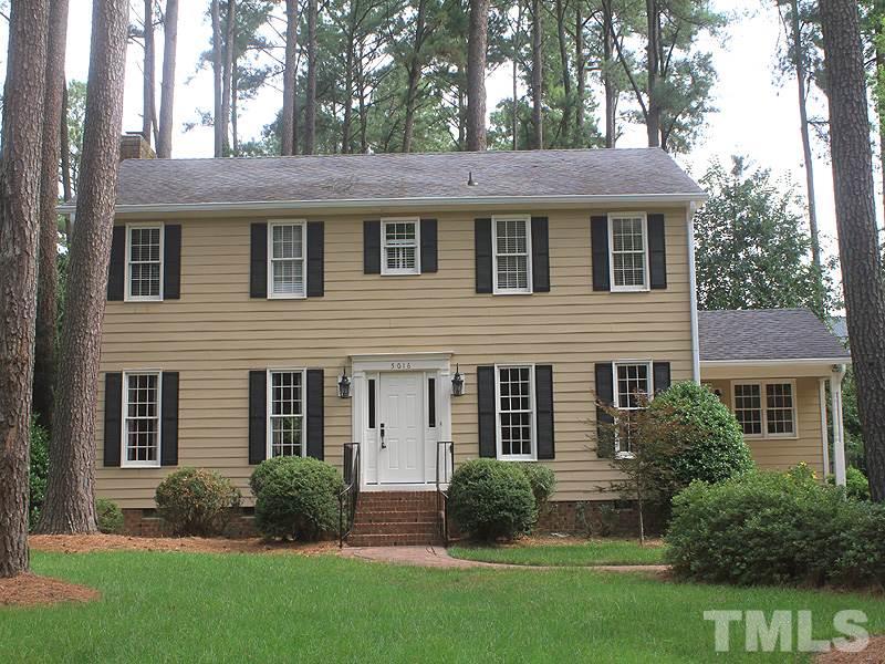 5016 Stonehill Drive Raleigh, NC 27609 - Photo 1 of 22 front view of a house with a yard