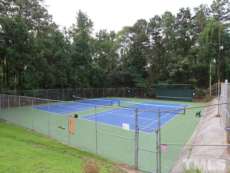 5016 Stonehill Drive Raleigh, NC 27609 - Photo 22 of 22 a view of a tennis court