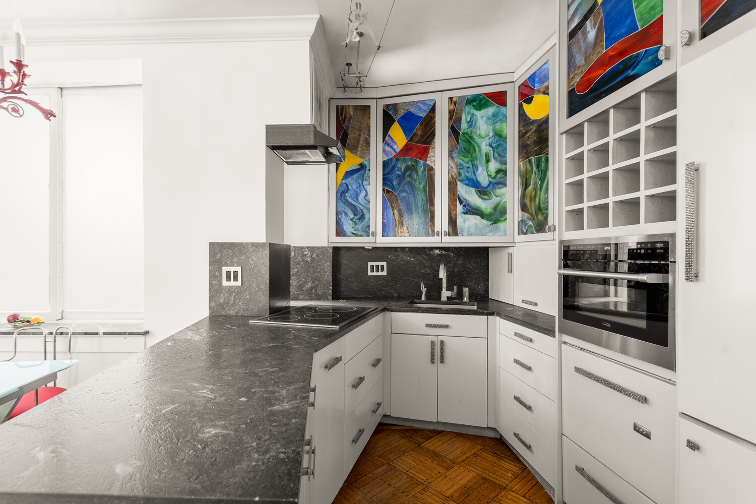 205 West 57th Street, Unit 3DB Manhattan, NY 10019 - Photo 15 of 28 a kitchen with stainless steel appliances granite countertop a sink and a stove
