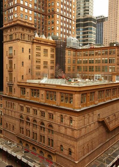 205 West 57th Street, Unit 3DB Manhattan, NY 10019 - Photo 21 of 28 a building with glass windows