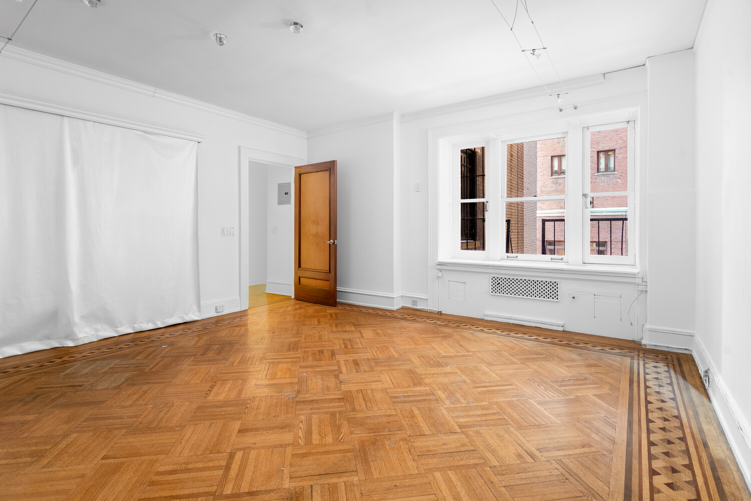 205 West 57th Street, Unit 3DB Manhattan, NY 10019 - Photo 24 of 28 a view of an empty room with a window