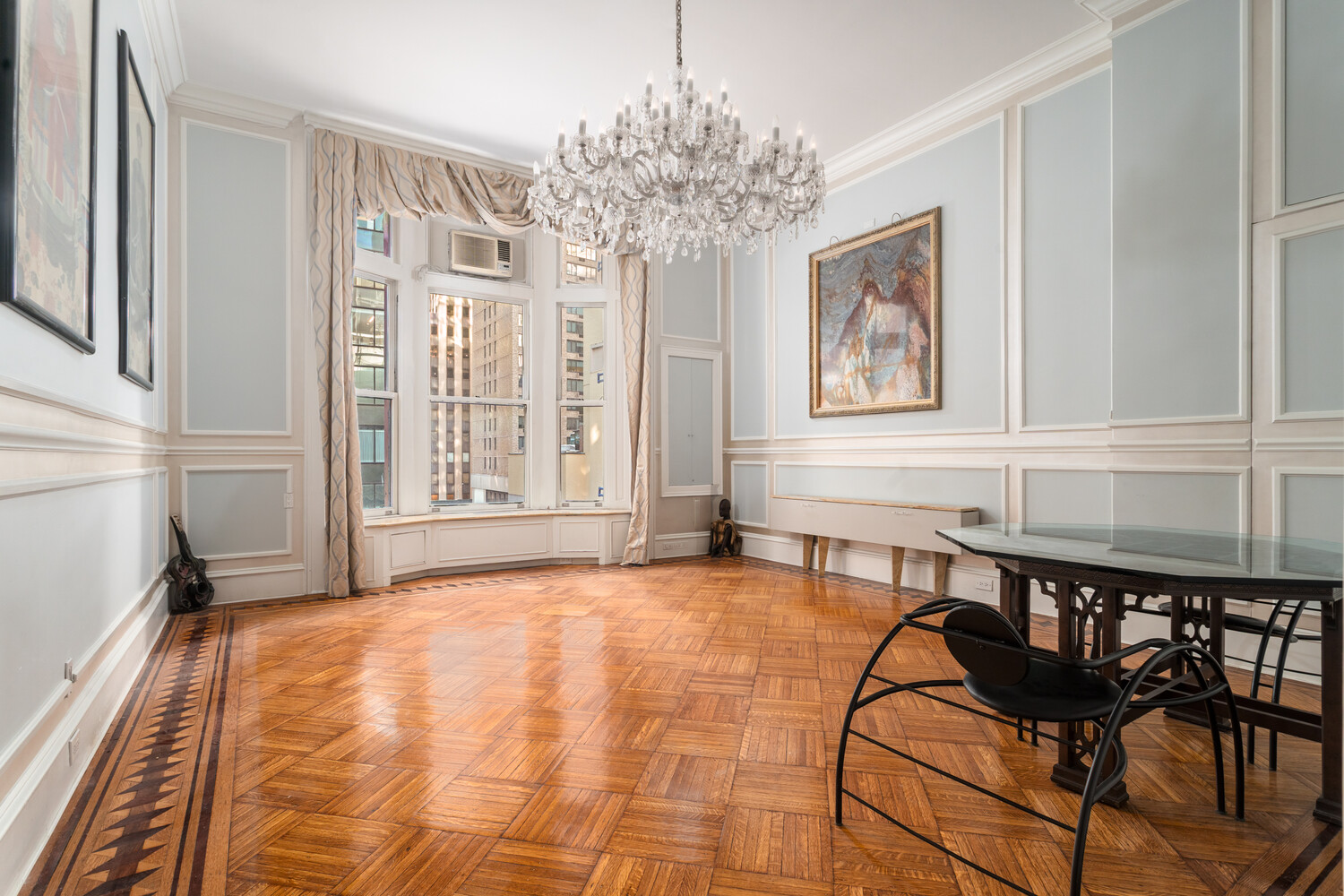 205 West 57th Street, Unit 3DB Manhattan, NY 10019 - Photo 2 of 28 a view of a bedroom with furniture window and wooden floor