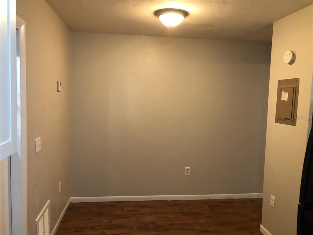 6818 Southwest 42nd Place, Unit D Gainesville, FL 32608 - Photo 6 of 16 a view of small space with racks on the wall