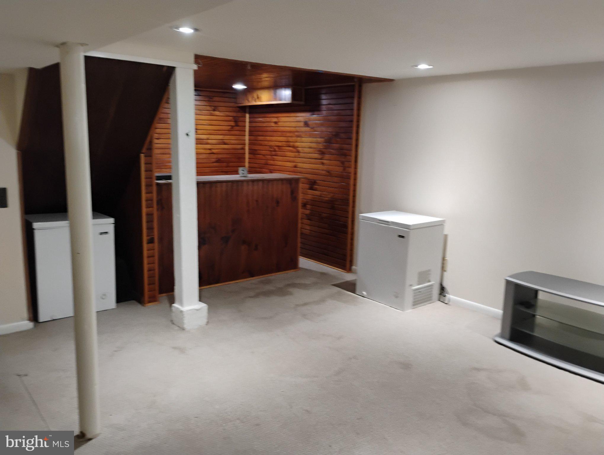 3908 Lantern Drive Silver Spring, MD 20902 - Photo 12 of 15 a view of an empty room with a fireplace