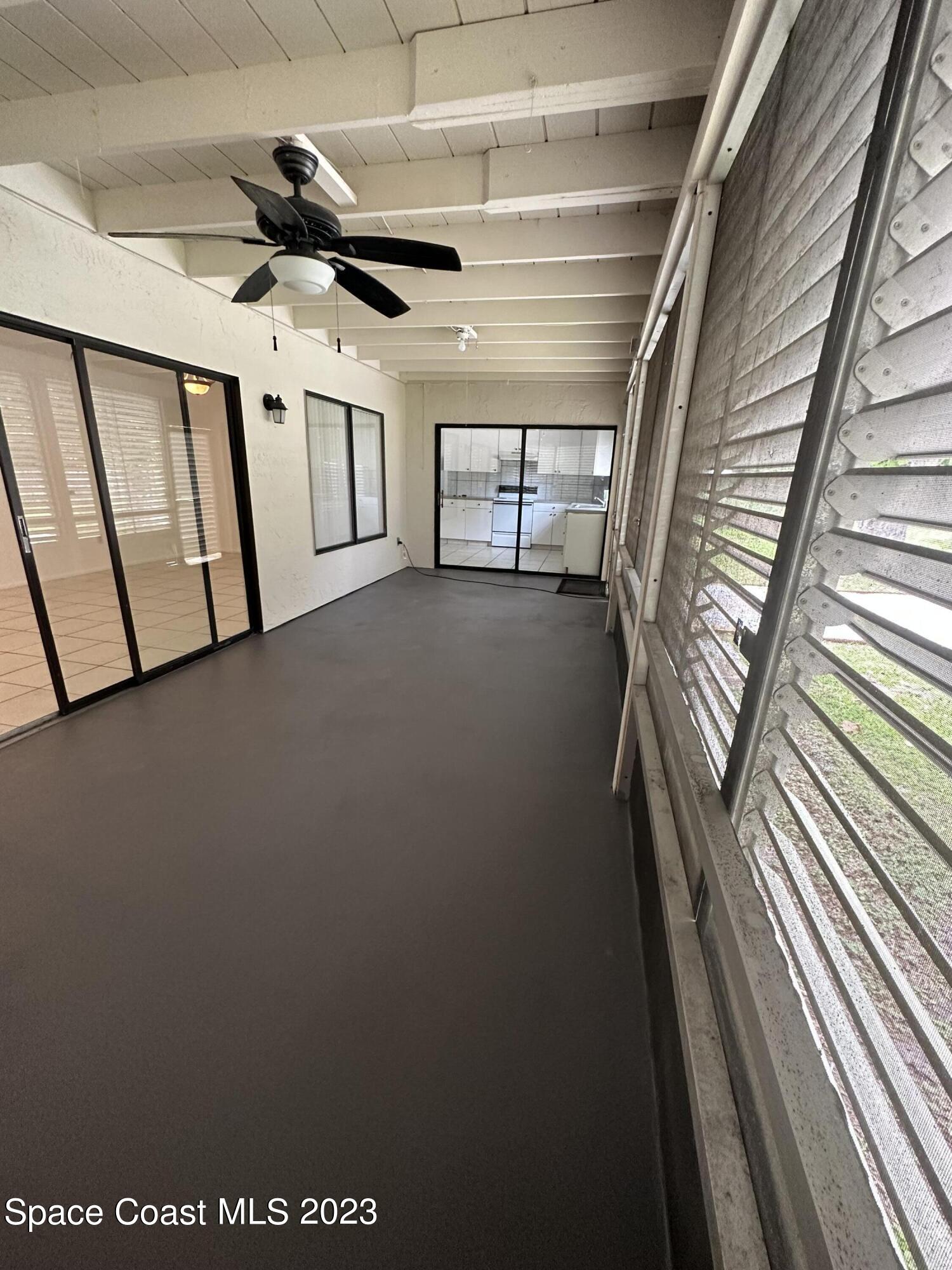 1331 Creel Road Northeast Palm Bay, FL 32905 - Photo 12 of 21 a view of an empty room with a window