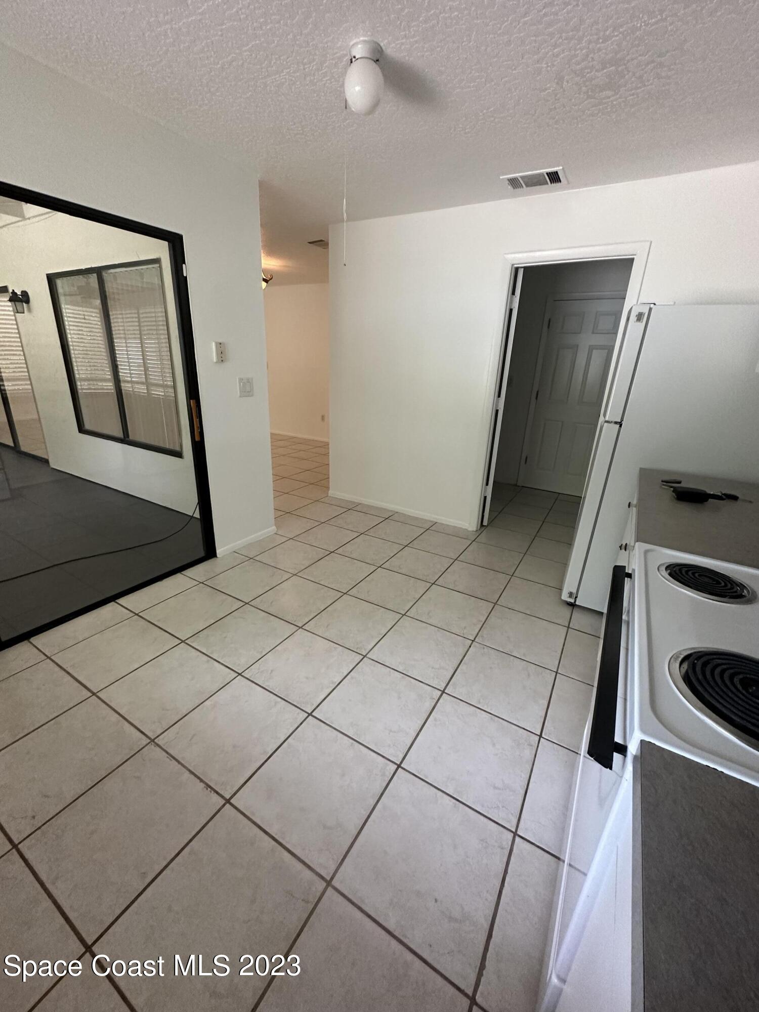 1331 Creel Road Northeast Palm Bay, FL 32905 - Photo 14 of 21 a view of a storage & utility room