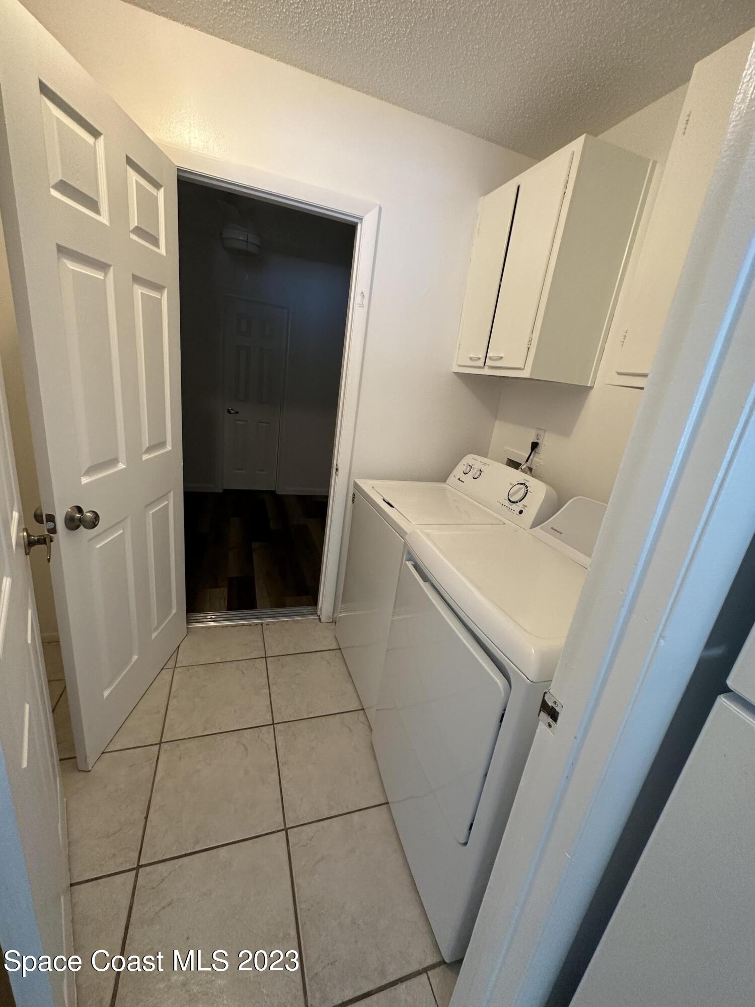 1331 Creel Road Northeast Palm Bay, FL 32905 - Photo 15 of 21 a bathroom with a sink and a mirror