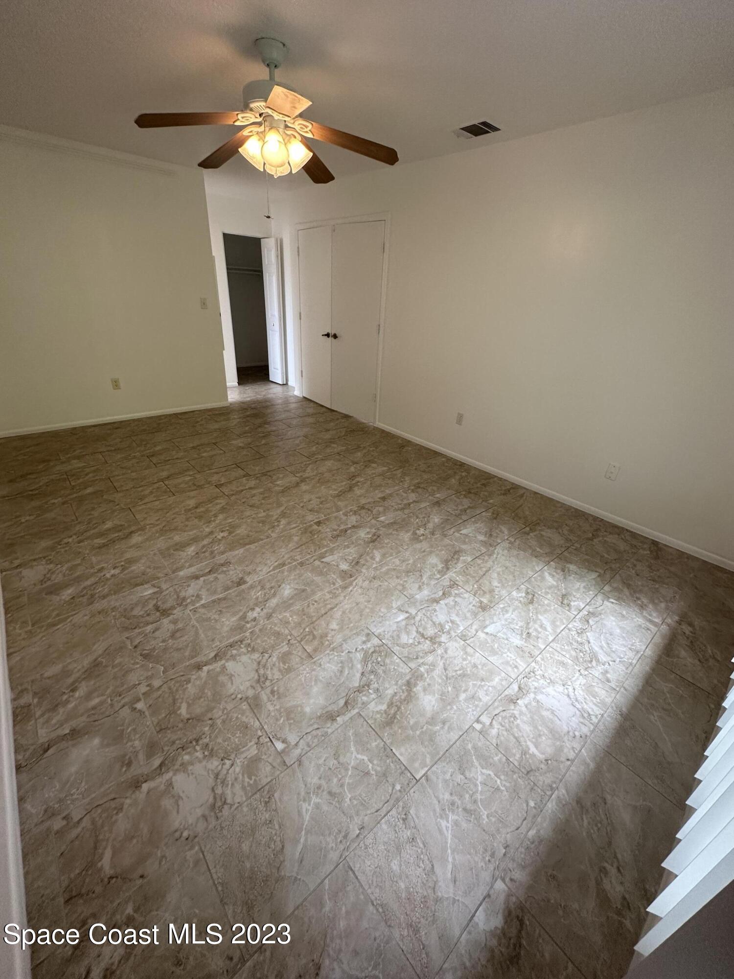 1331 Creel Road Northeast Palm Bay, FL 32905 - Photo 4 of 21 a view of an empty room