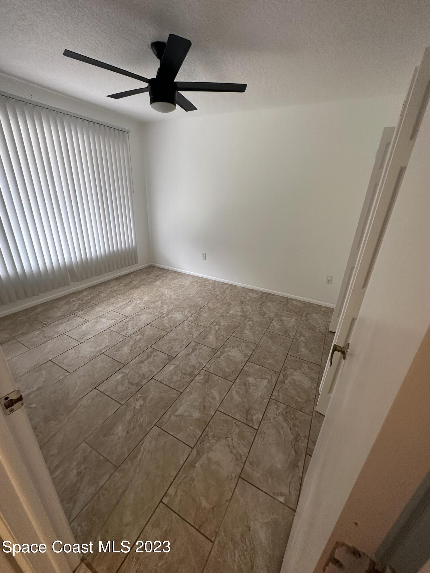 1331 Creel Road Northeast Palm Bay, FL 32905 - Photo 9 of 21 a view of an empty room