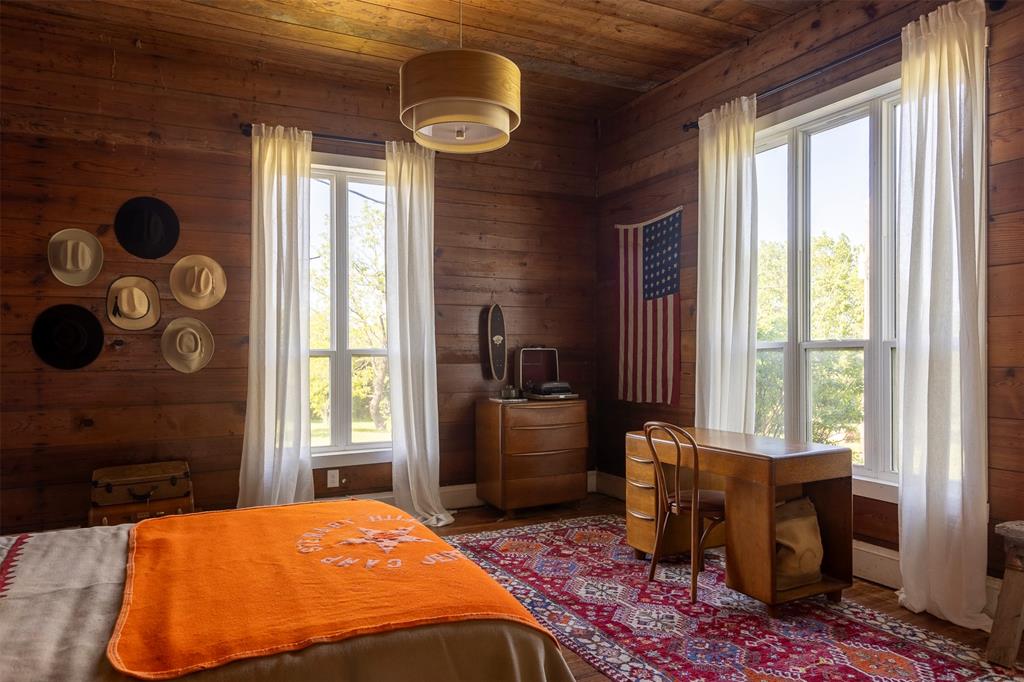 3183 Harrell Road Howe, TX 75459 - Photo 22 of 39 a bedroom with a bed and a window