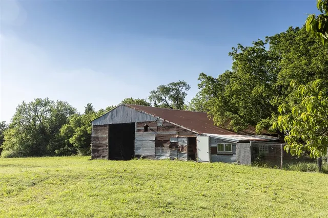 a house with trees in the background