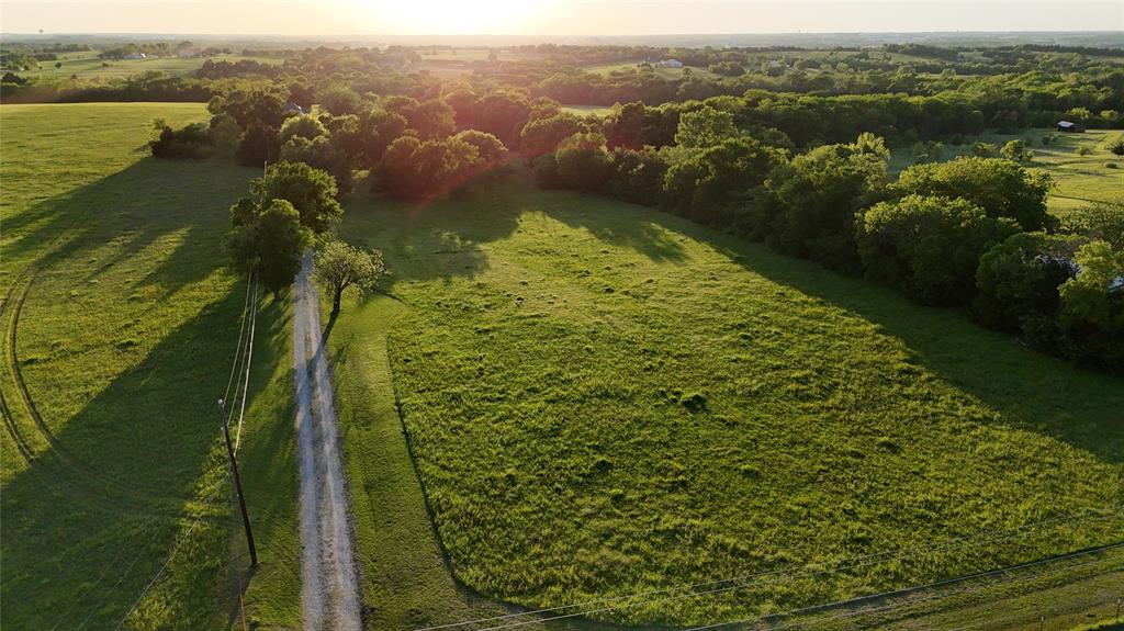 3183 Harrell Road Howe, TX 75459 - Photo 4 of 39 a view of a lake from a balcony