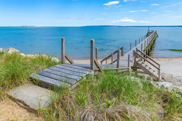a wooden bench sitting in the middle of a building