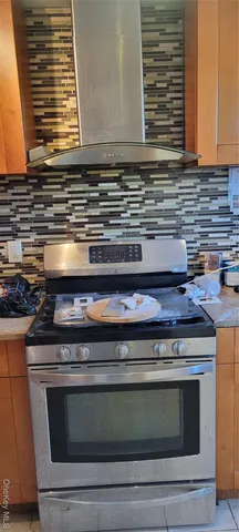 a view of room with wooden floor