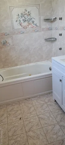 a bathroom with a toilet and a sink