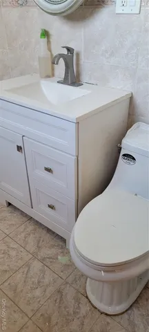 a view of a livingroom and window