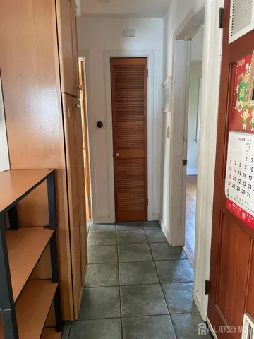 a view of entryway with a door