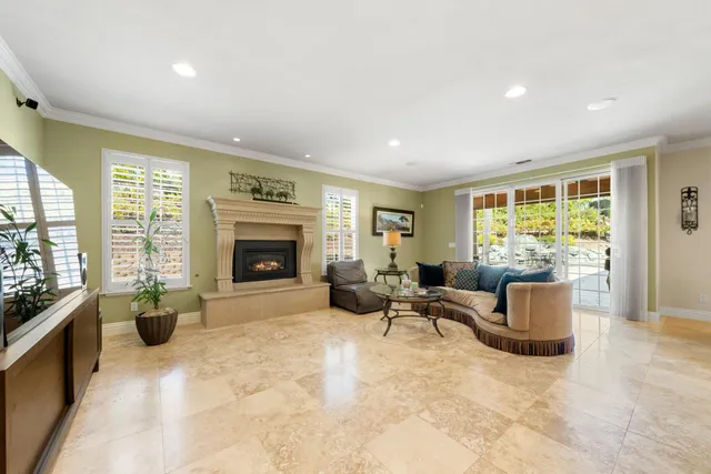 a kitchen with stainless steel appliances granite countertop a stove a sink dishwasher a oven and a refrigerator