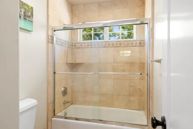 a view of a street with a building in the background