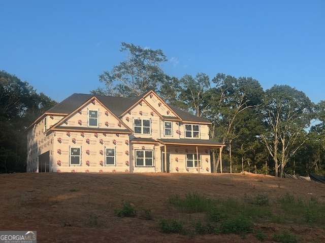 52 Collins Road Locust Grove, GA 30248 - Photo 1 of 1 a front view of a house with a garden