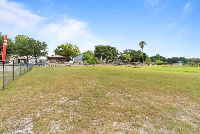 a house with trees in the background