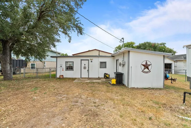 a view of a house with a patio