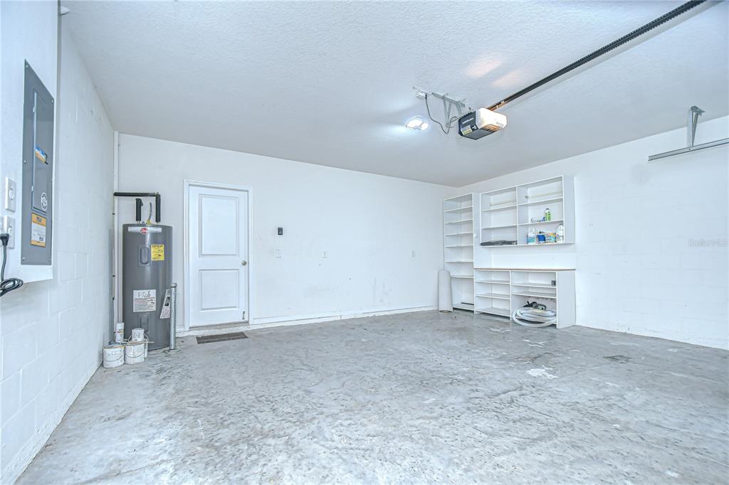 1382 Crescent Hoop Way Wesley Chapel, FL 33543 - Photo 23 of 27 a view of an empty room with a window
