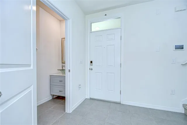 a view of room with closet and mirror