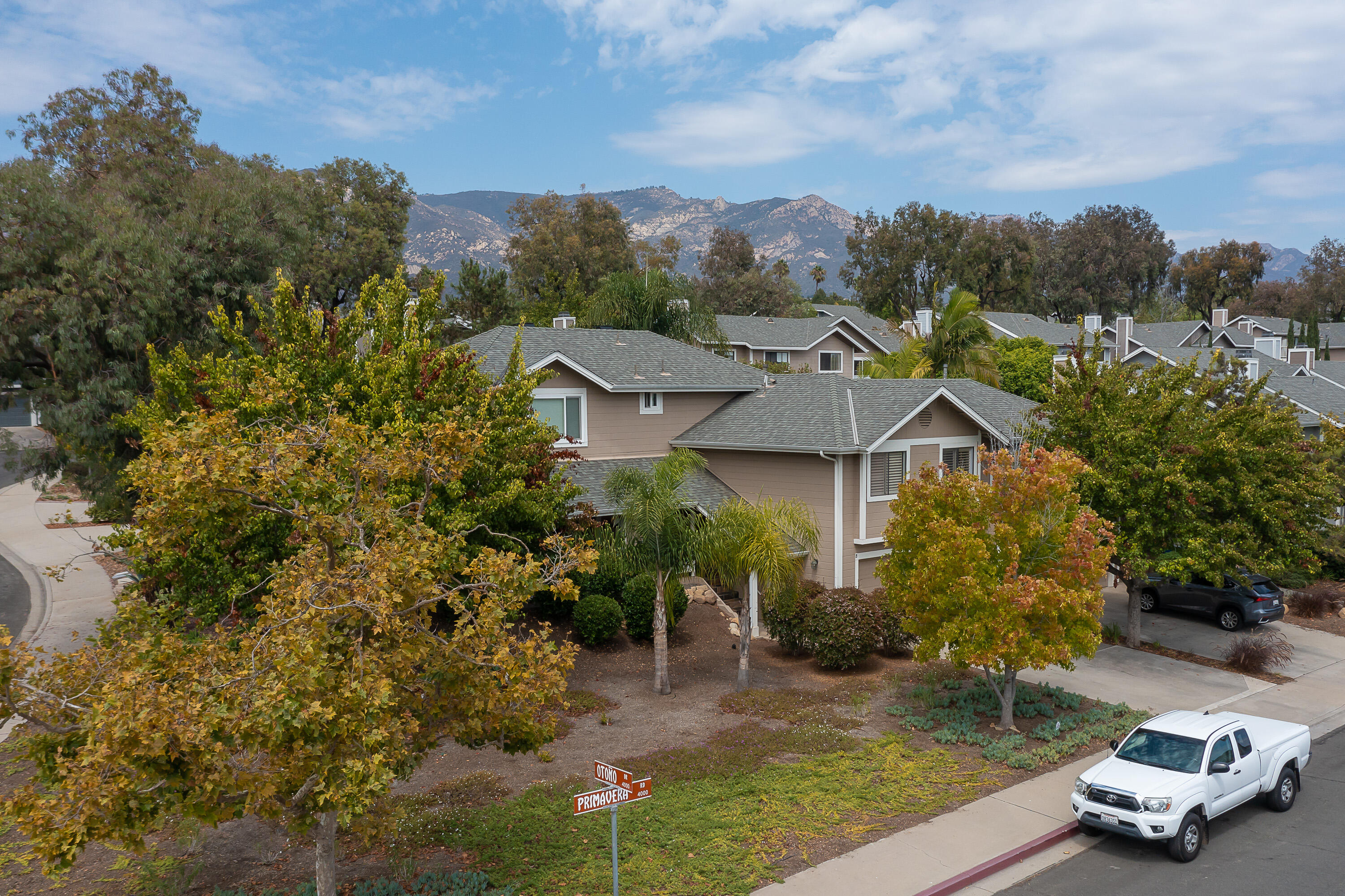 Fronting tree lined corner