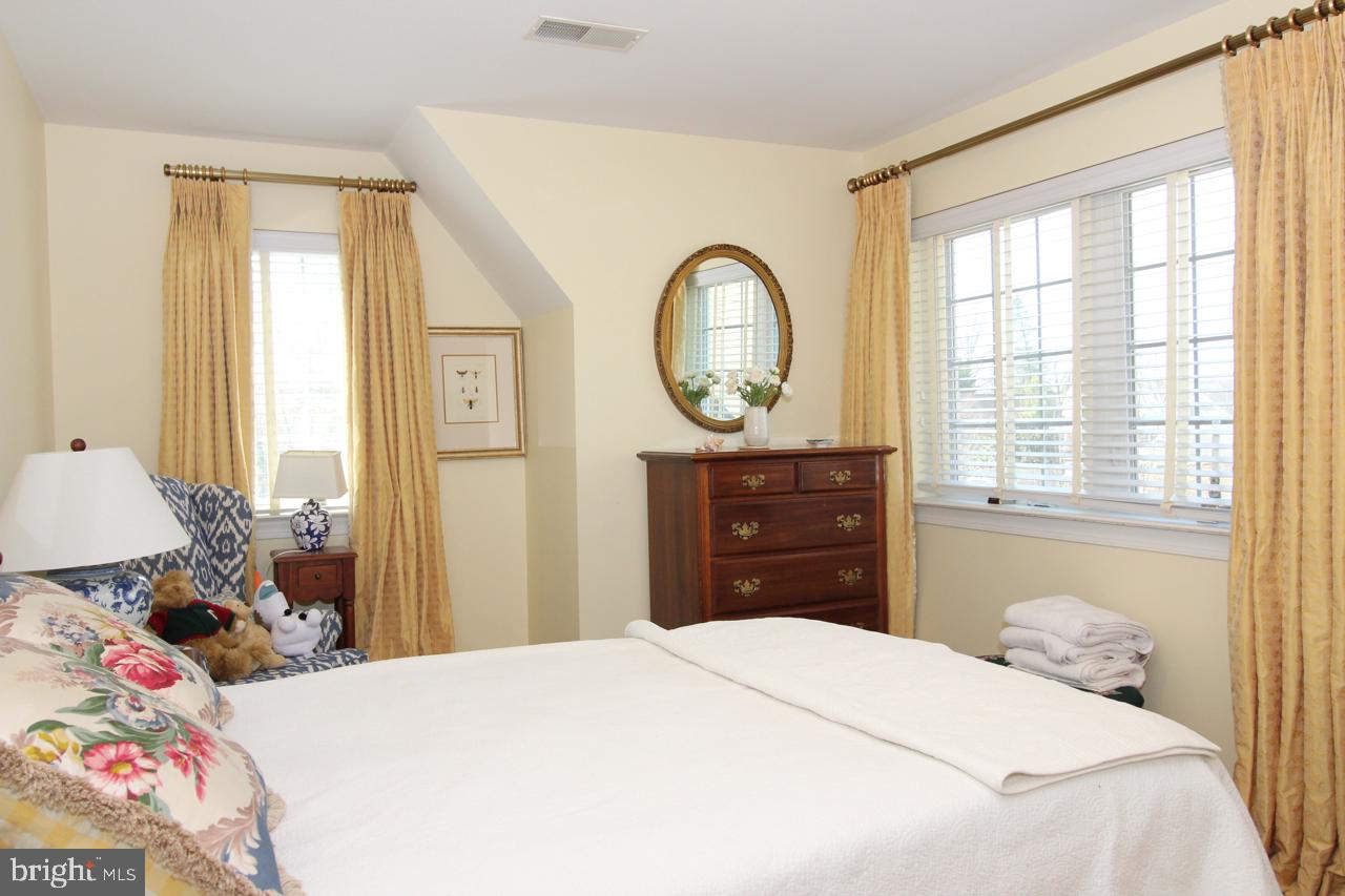 117 West 5th Street Media, PA 19063 - Photo 39 of 54 a bedroom with a bed and a window