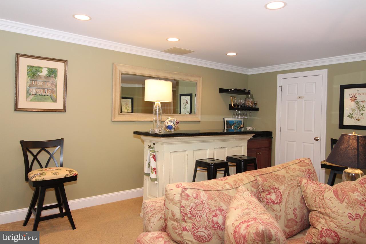 117 West 5th Street Media, PA 19063 - Photo 44 of 54 a bedroom with a bed and a chair