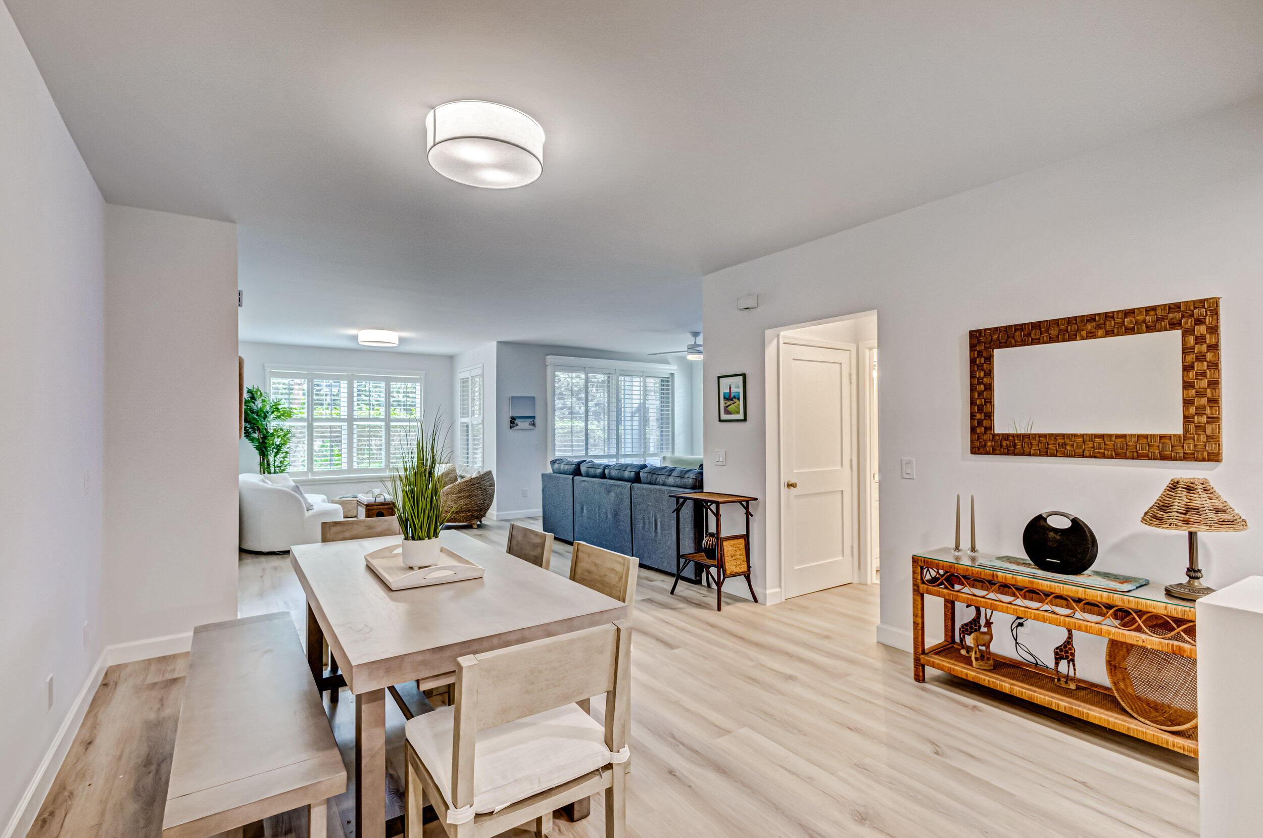 207 Mainsail Circle Jupiter, FL 33477 - Photo 15 of 56 a living room with furniture and a wooden floor