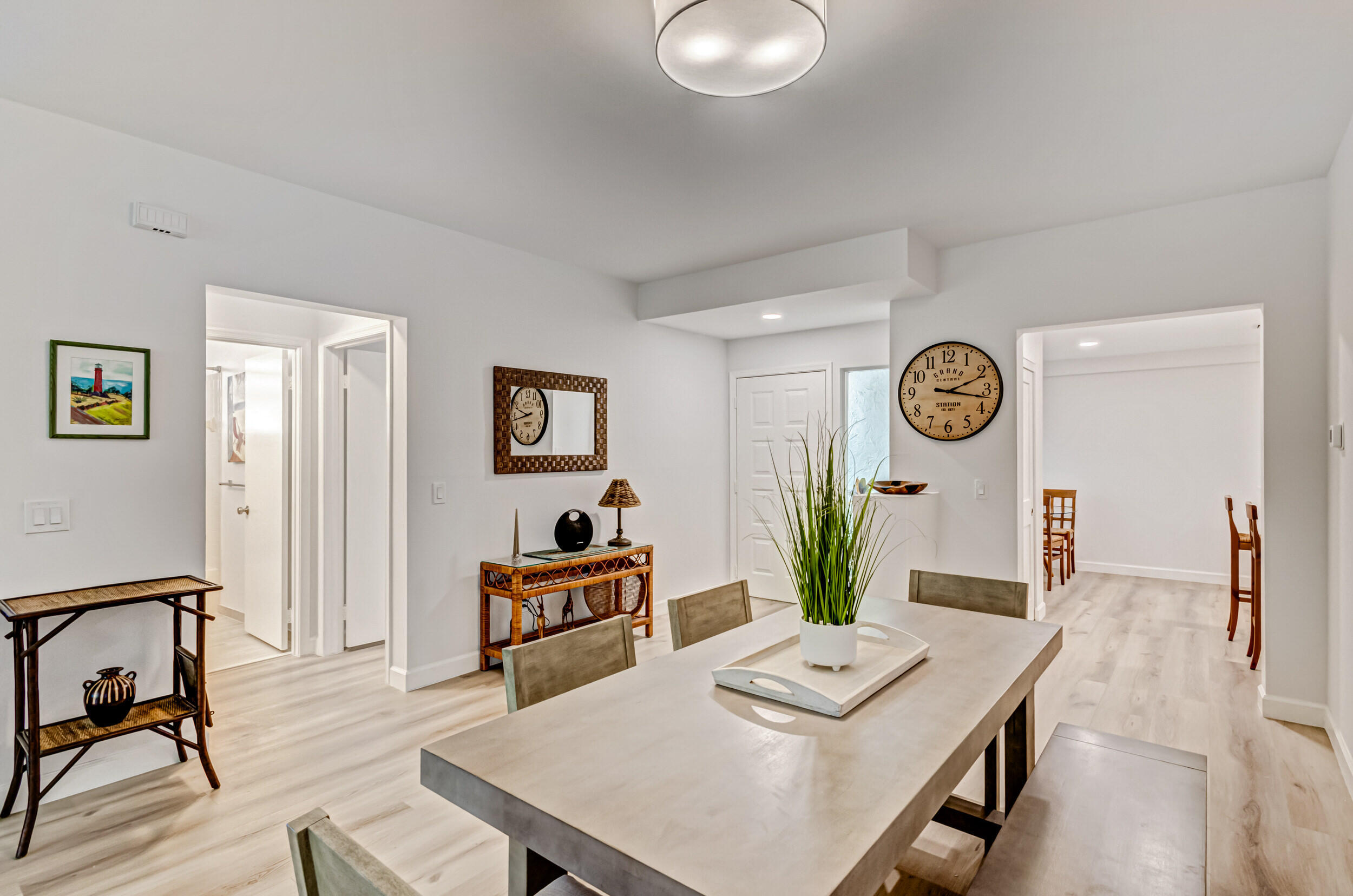 207 Mainsail Circle Jupiter, FL 33477 - Photo 16 of 56 a living room with furniture and a table