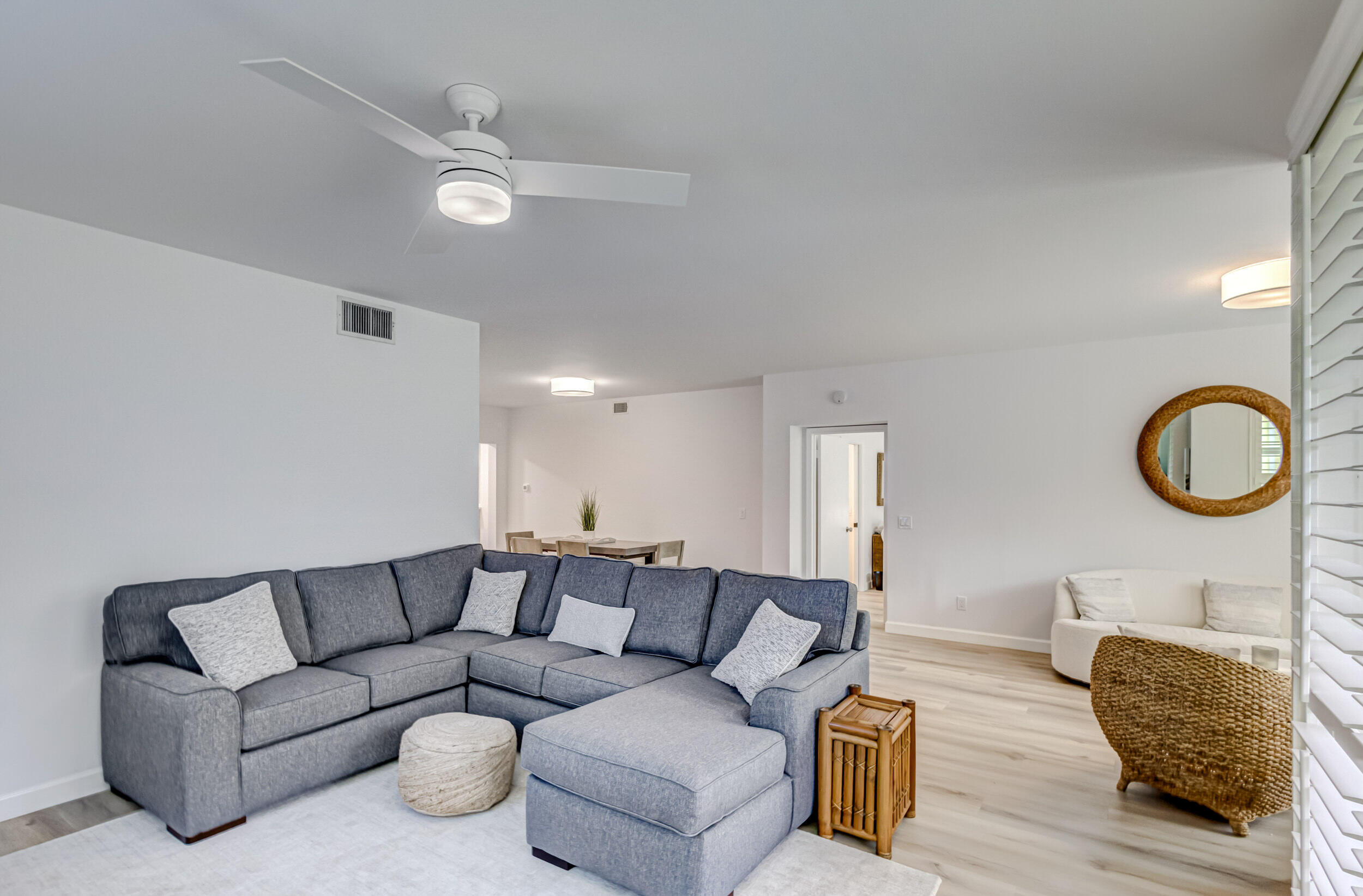 207 Mainsail Circle Jupiter, FL 33477 - Photo 20 of 56 a living room with furniture and a wooden floor