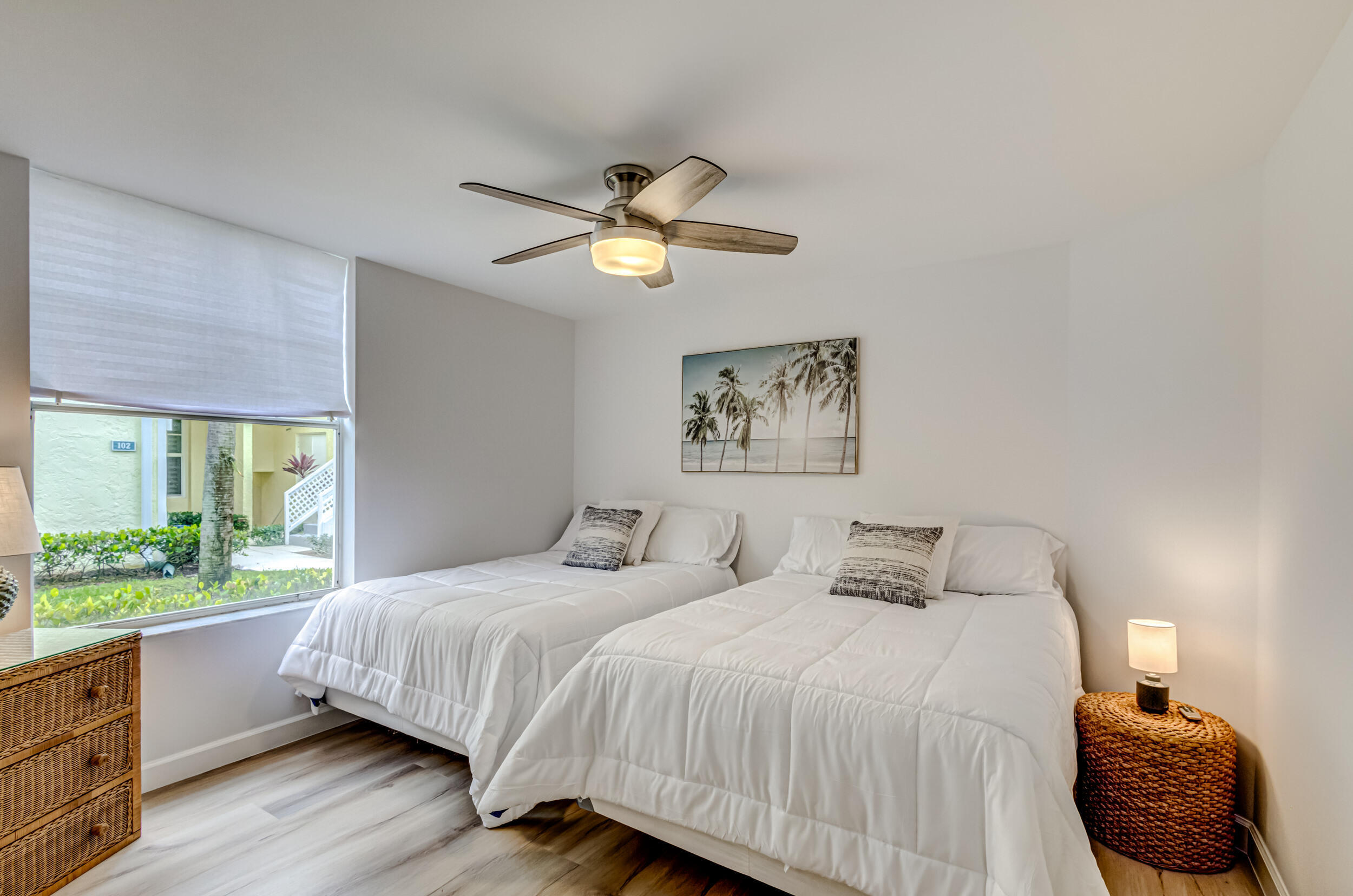 207 Mainsail Circle Jupiter, FL 33477 - Photo 31 of 56 a bedroom with a large bed and a window