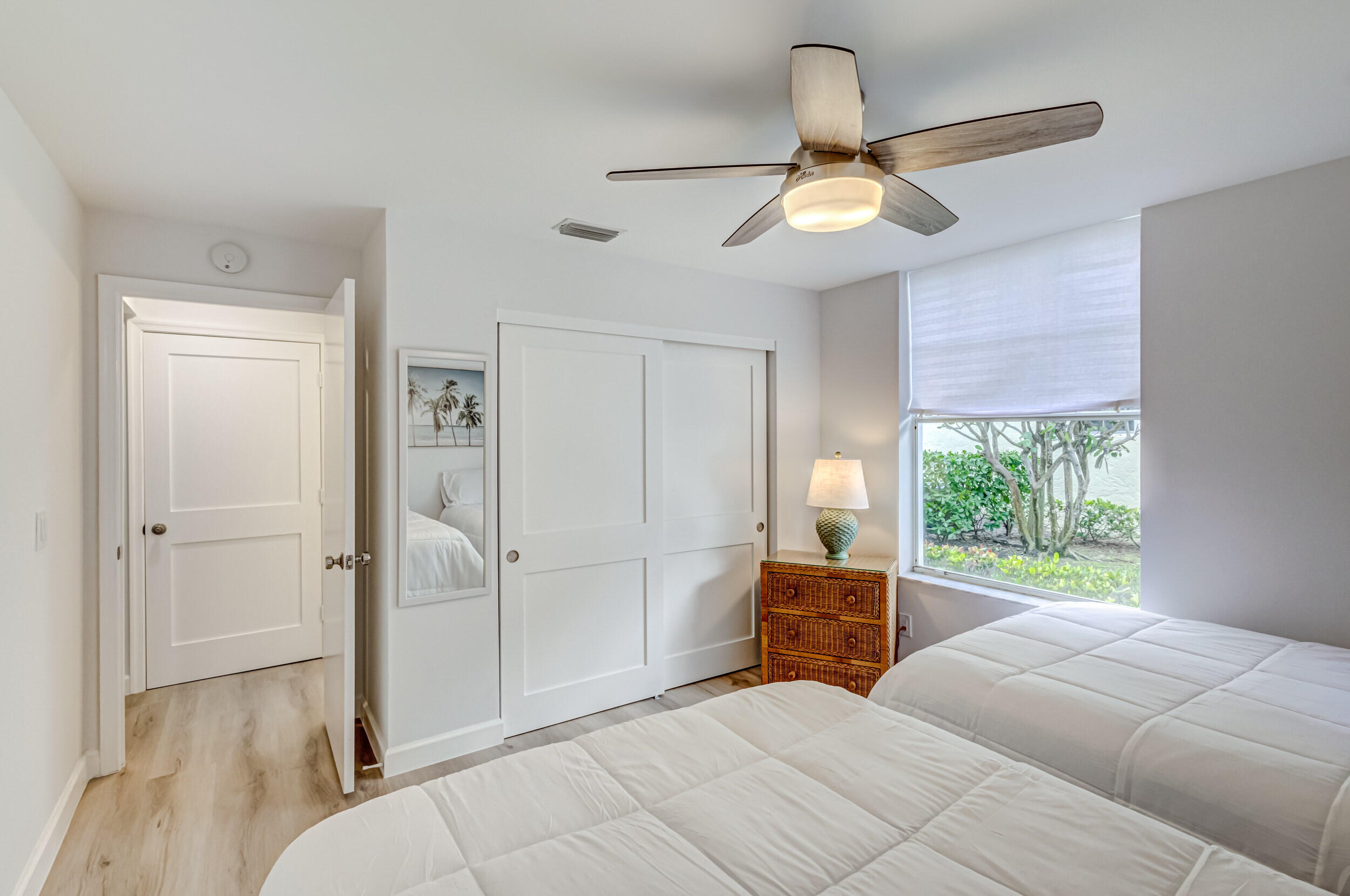 207 Mainsail Circle Jupiter, FL 33477 - Photo 32 of 56 a bedroom with a bed and a window