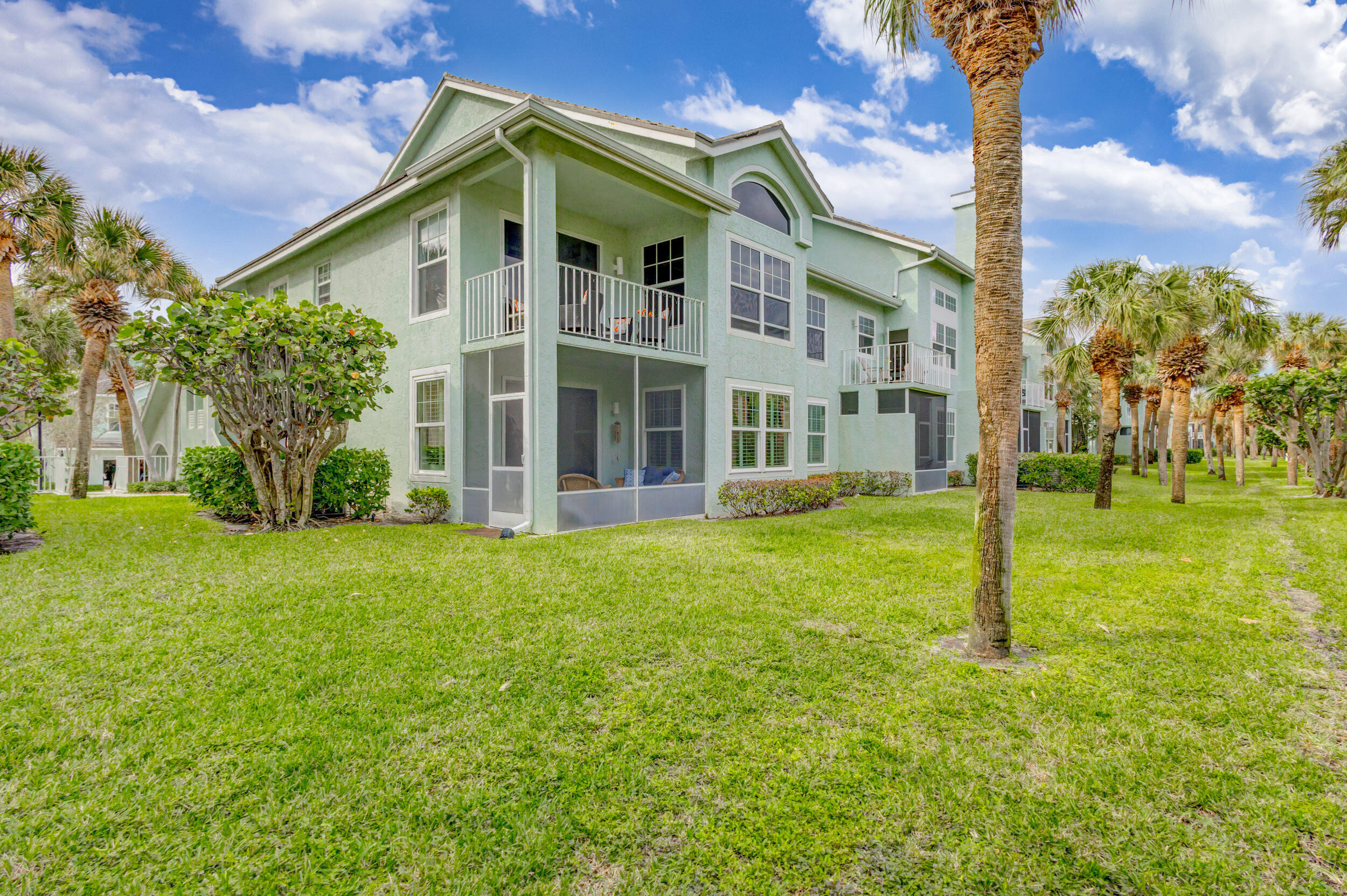 207 Mainsail Circle Jupiter, FL 33477 - Photo 37 of 56 a front view of a house with a yard