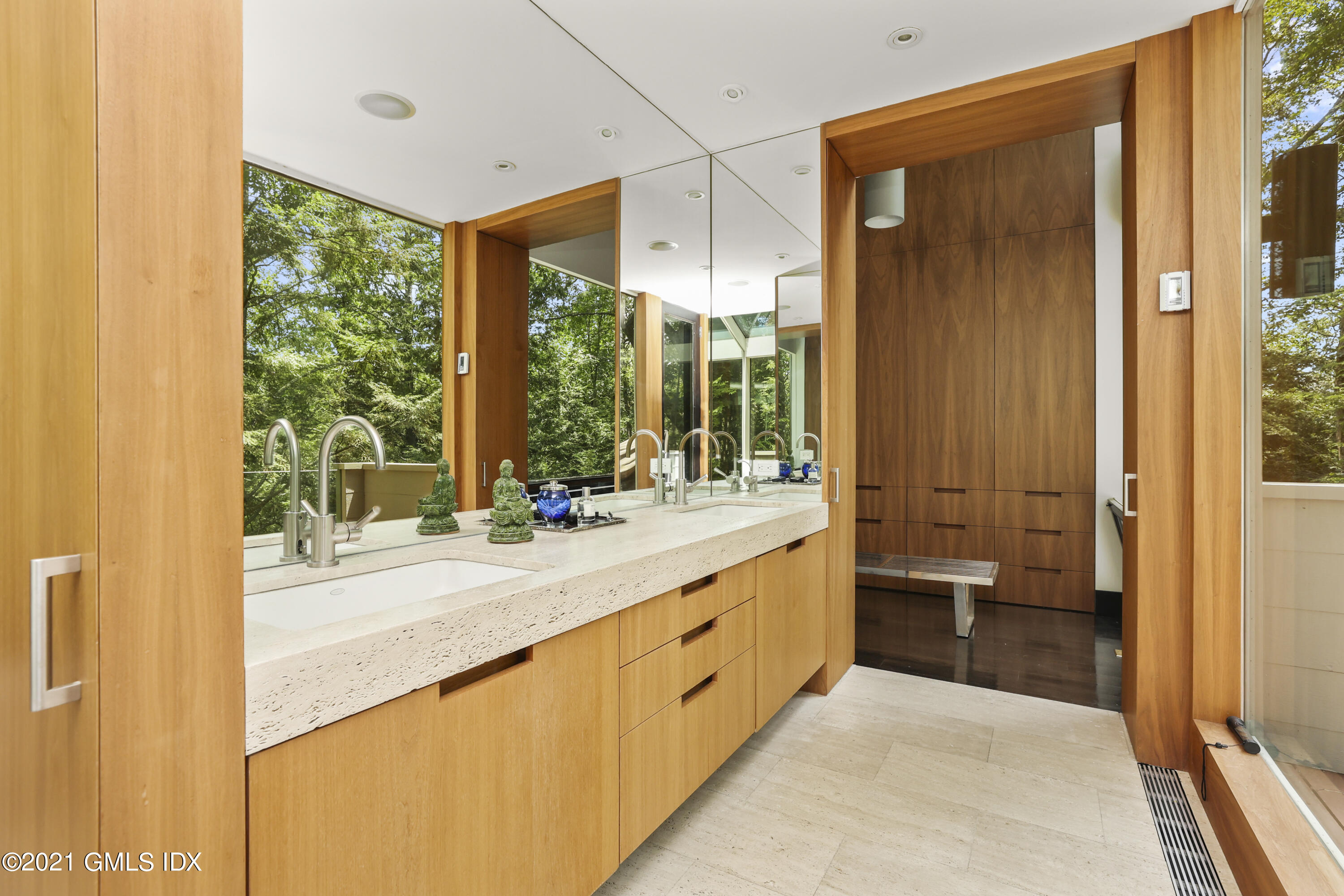 49 Mill Brook Road, Unit WEST Stamford, CT 06902 - Photo 18 of 37 a bathroom with sink shower and mirror