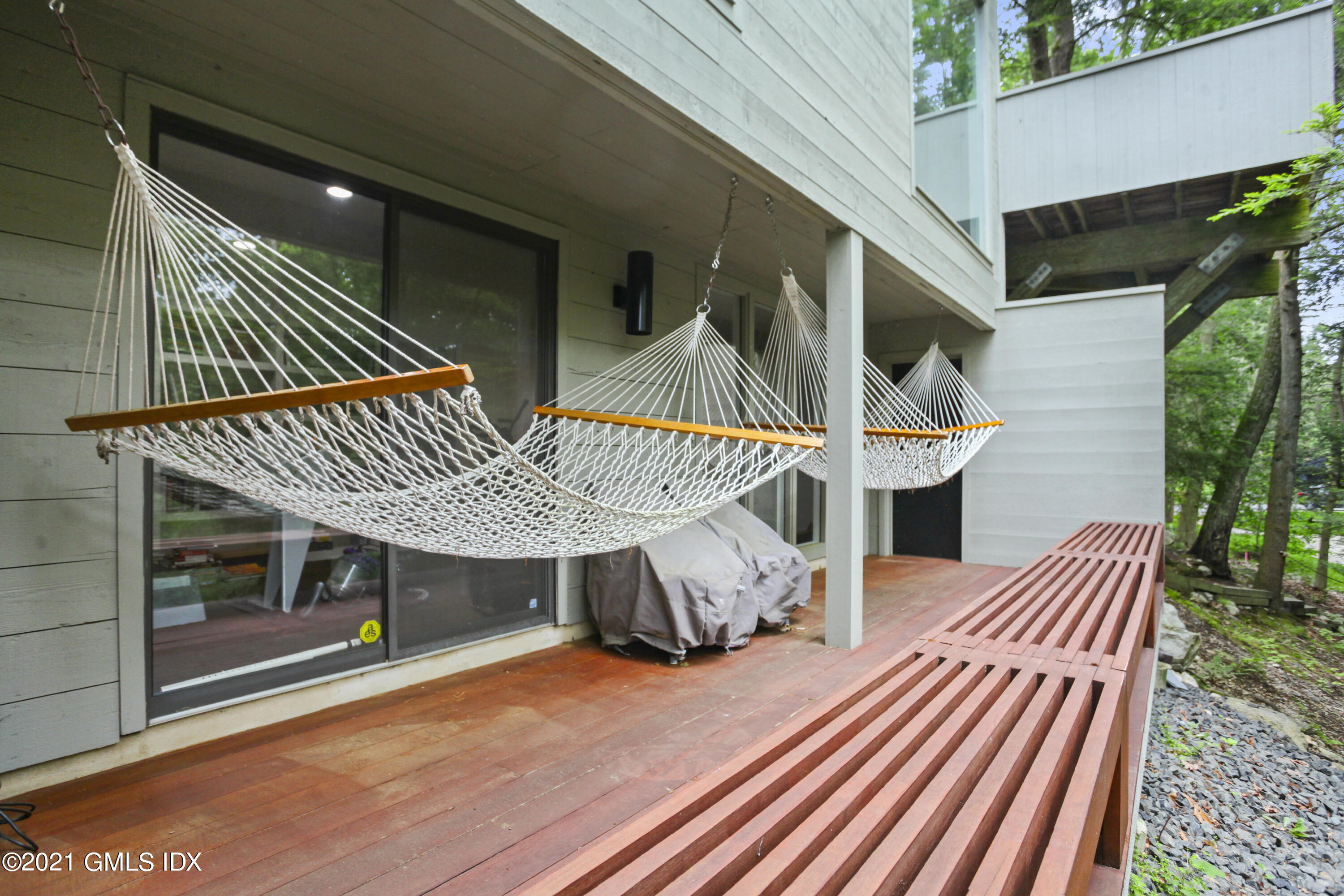49 Mill Brook Road, Unit WEST Stamford, CT 06902 - Photo 29 of 37 a view of outdoor space yard deck patio and swimming pool