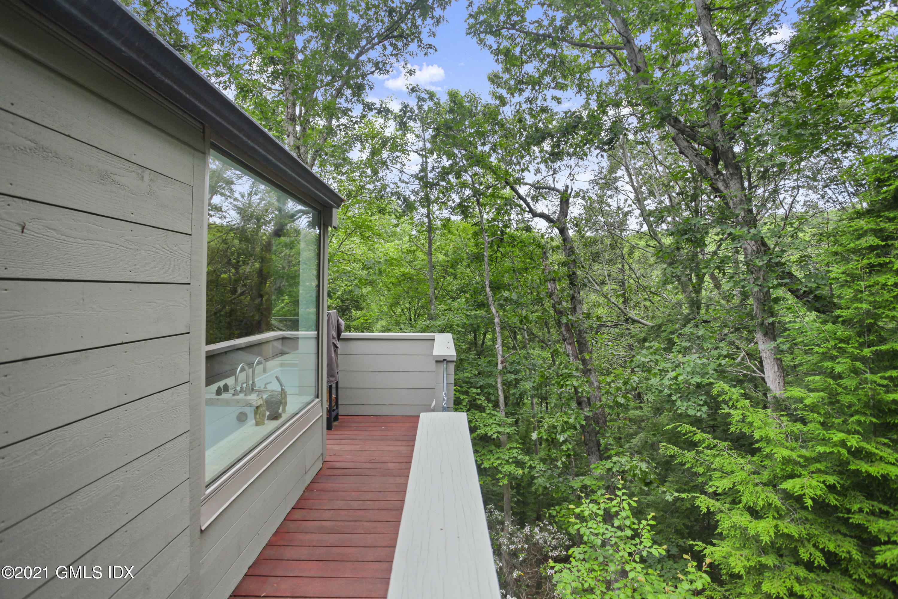 49 Mill Brook Road, Unit WEST Stamford, CT 06902 - Photo 32 of 37 a view of balcony of the house
