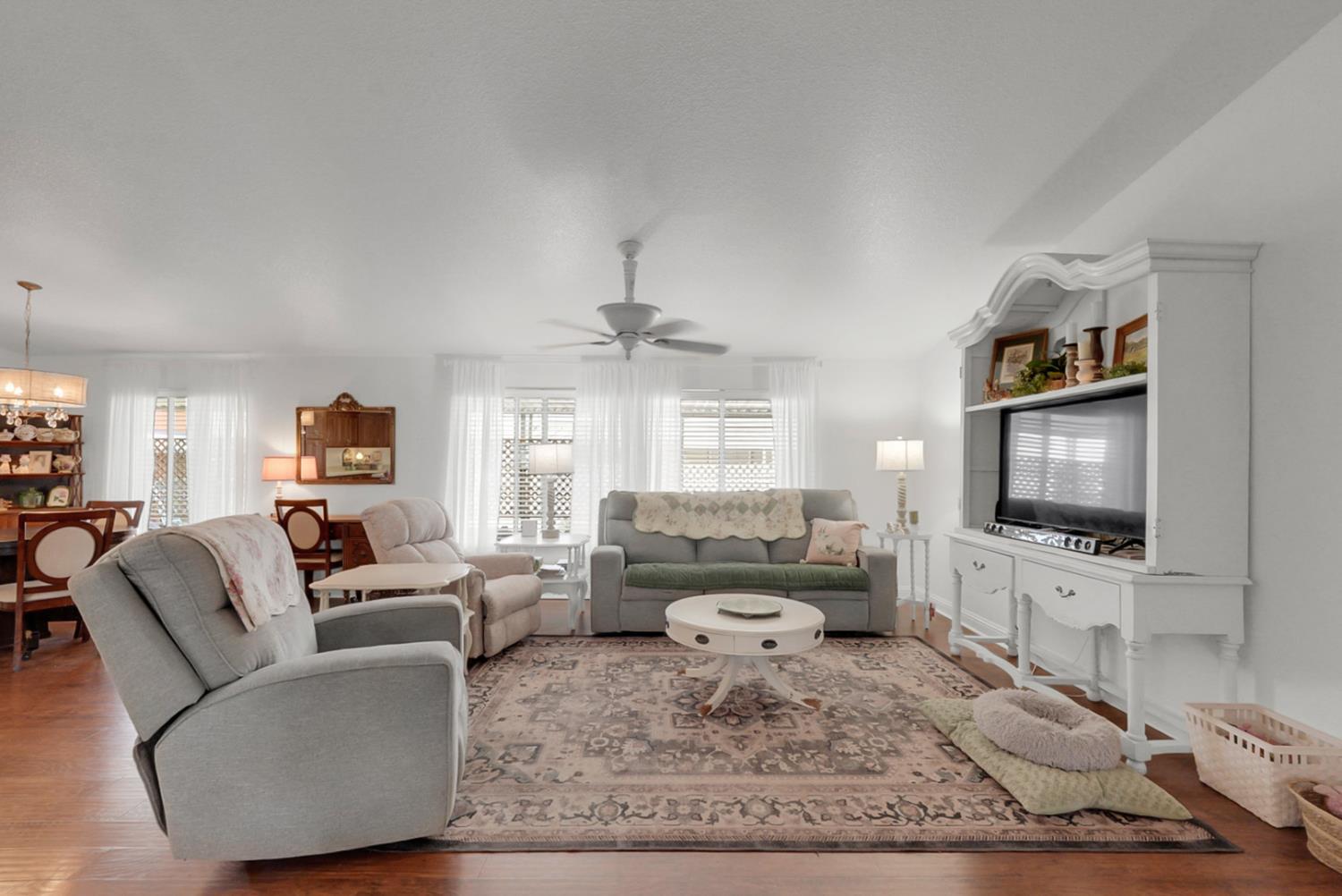 1459 Standiford, Unit 92 Modesto, CA 95350 - Photo 1 of 19 a living room with furniture and a flat screen tv